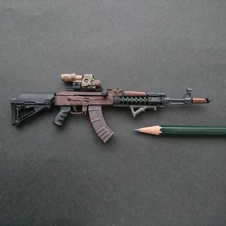 image showing unboxed assault rifles